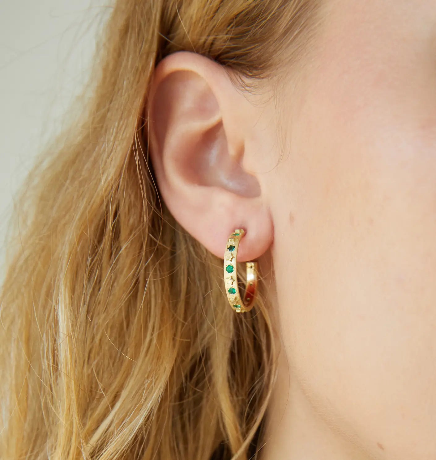 Elizabeth Moore Fine Jewelry Celestial Collection Emeralds Star Hoops on Model